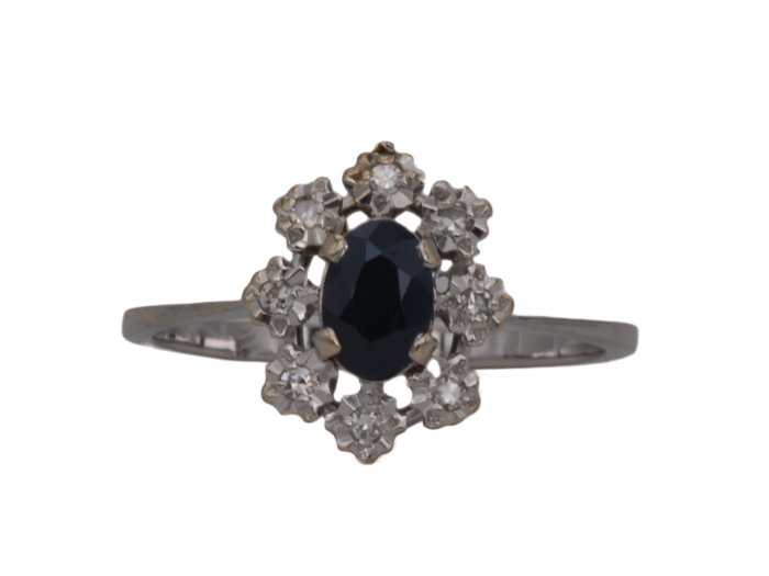 Bague Marguerite en Or Blanc avec saphir et diamants en serti étoilé.