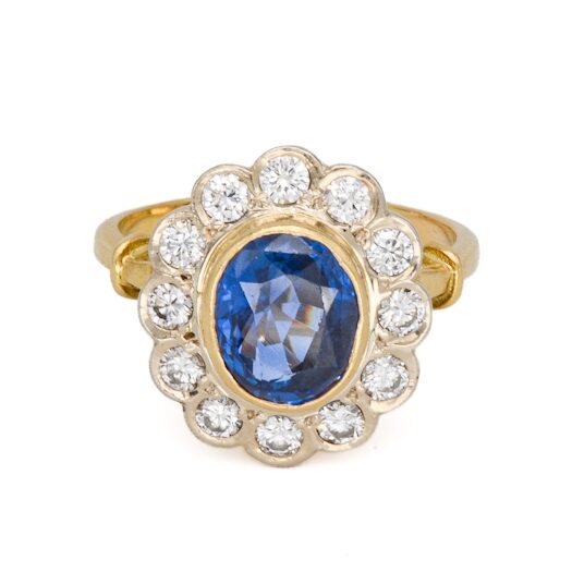 Bague marguerite ancienne saphir et diamants en or jaune 18 carats