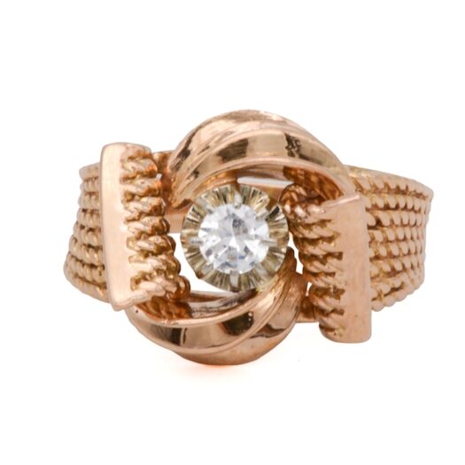 Diamant naturel taille brillant de 0,20 carat serti griffes sur une bague ancienne en or rose.